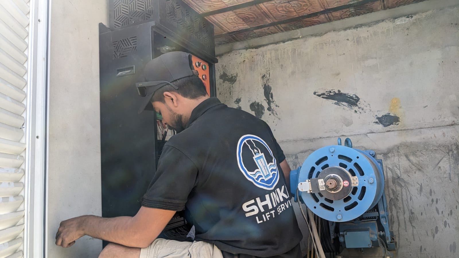 Shinkai technician carrying out on-site lift work