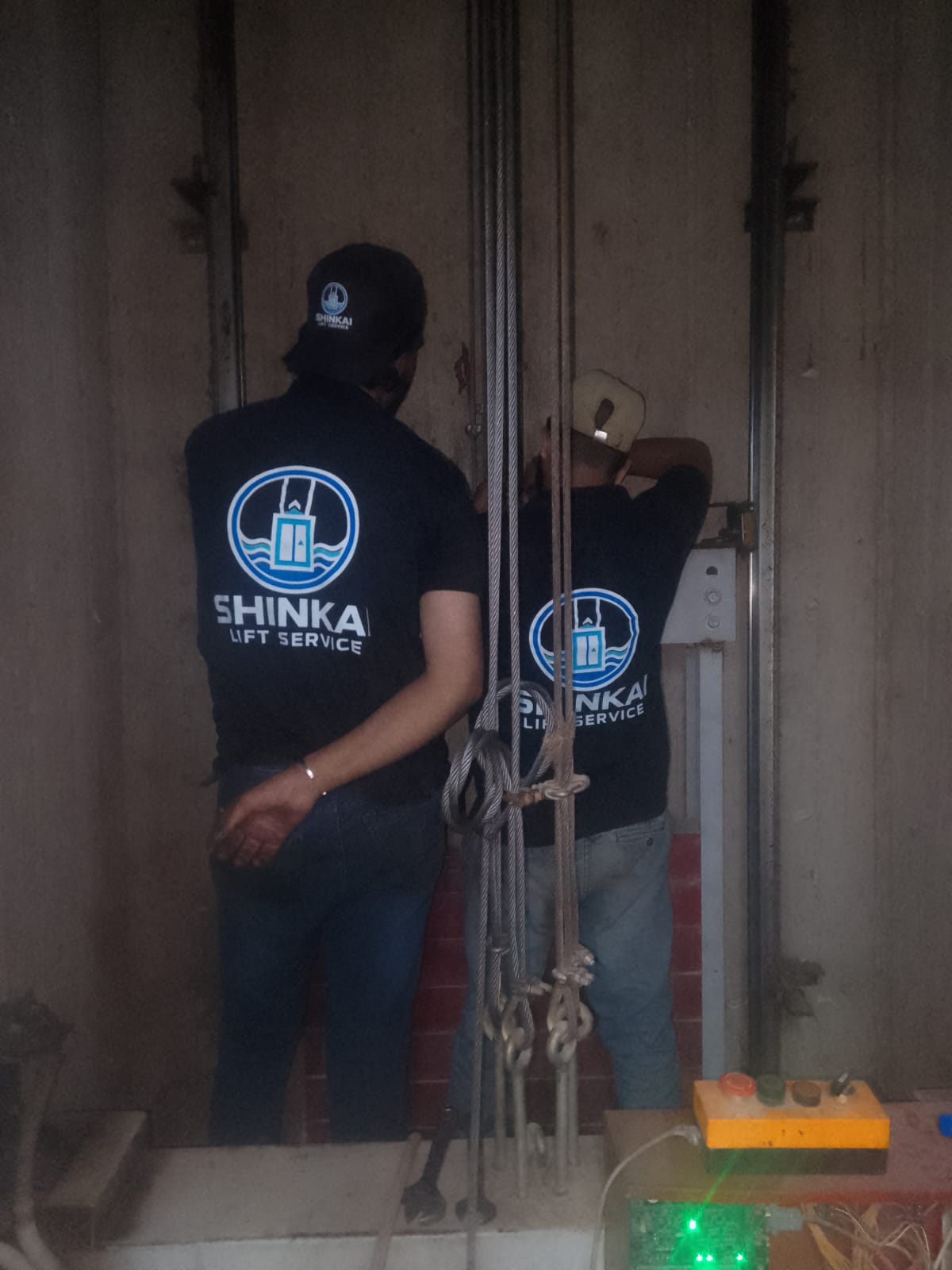 Shinkai team working at a lift shaft
